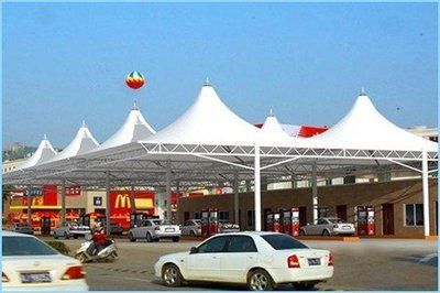 加油站頂棚造價(jià)高嗎（加油站頂棚造價(jià)是否算高） 鋼結(jié)構(gòu)鋼結(jié)構(gòu)螺旋樓梯施工 第3張