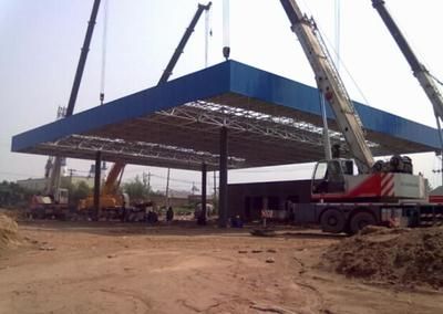 加油站鋼構(gòu)棚設(shè)計(jì)規(guī)范最新(關(guān)于加油站鋼構(gòu)棚設(shè)計(jì)規(guī)范的最新信息) 鋼結(jié)構(gòu)門式鋼架施工 第1張 加油站鋼構(gòu)棚設(shè)計(jì)規(guī)范最新(關(guān)于加油站鋼構(gòu)棚設(shè)計(jì)規(guī)范的最新信息) 鋼結(jié)構(gòu)門式鋼架施工 第1張